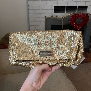 Victoria’s Secret gold glitter clutch